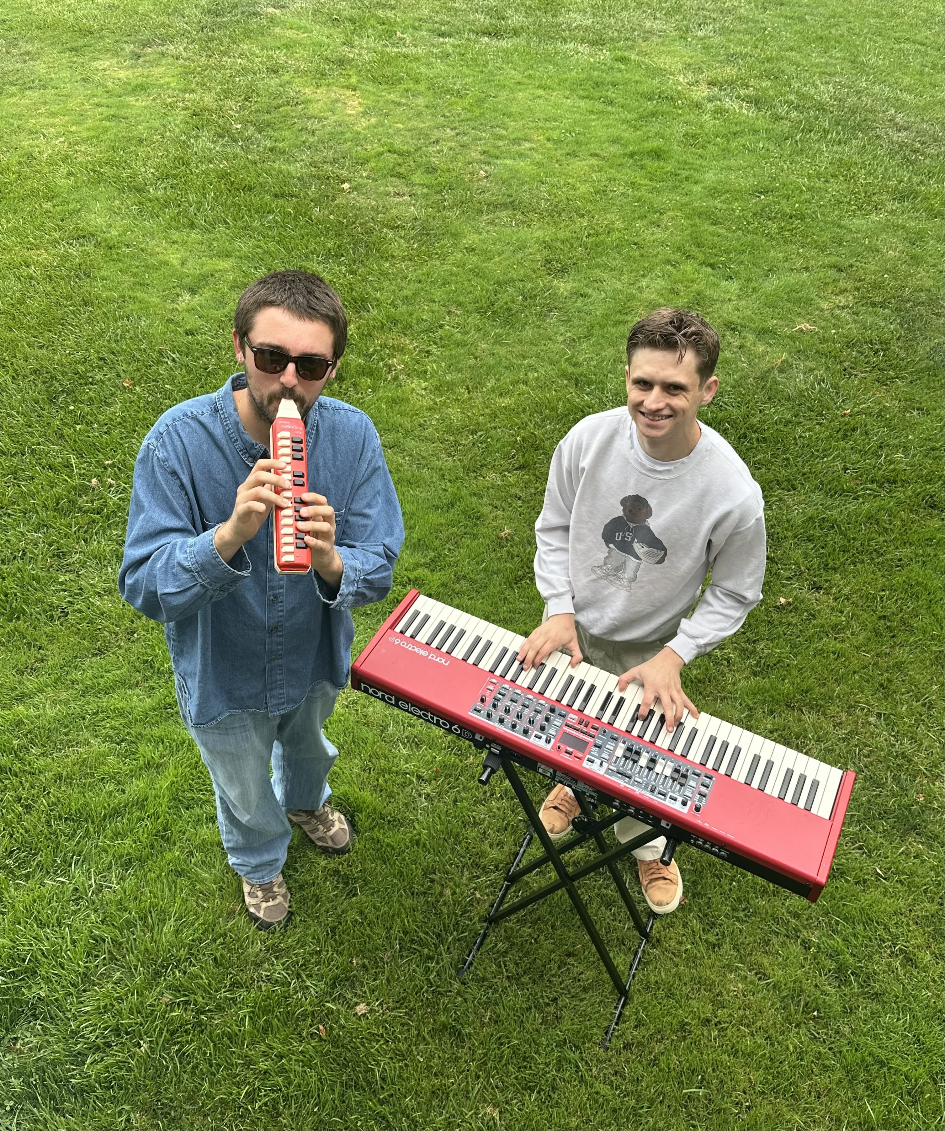 Northern Disconnection playing outdoors surrounded by greenery